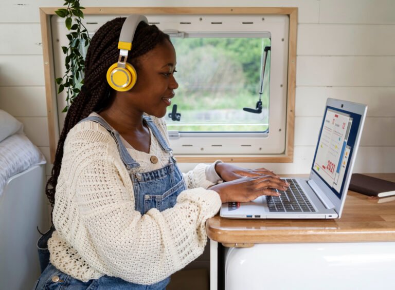 A person working remotely on a laptop